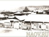 Вид Николаевской больничной церкви в городской застройке в начале XX века