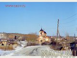 Вид с запада в панораме села Шила. Фотография Разваляева Е.О., 2004 год.

